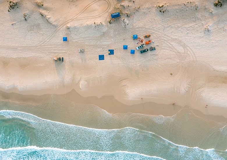 spill drill - overhead view of crew on beach